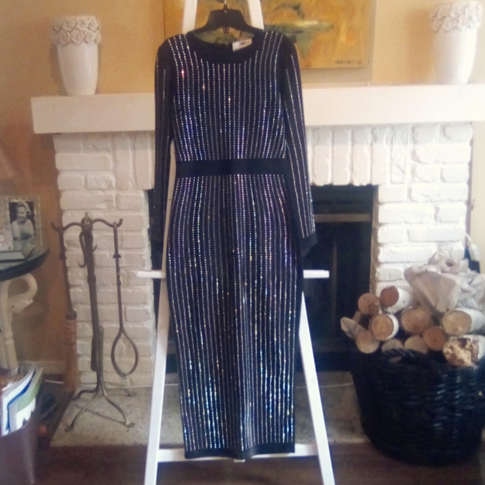 Kiki Kuture ankle length dress with decorative studs.  Kick pleat to knee.
